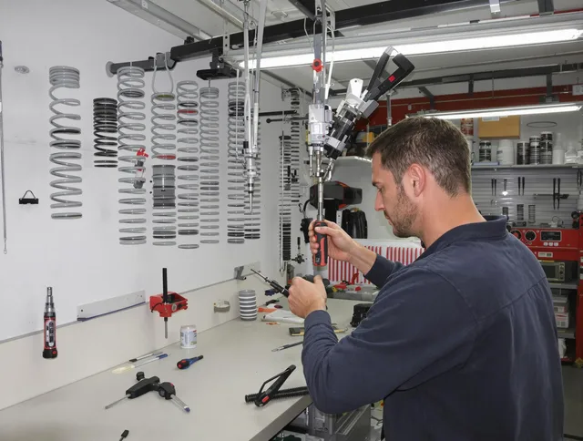 Lakeland Garage Door Repair safety certified technician performing precision spring replacement in Lakeland